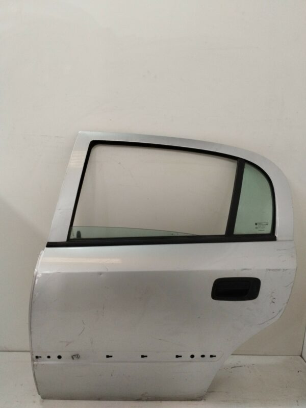 PUERTA TRASERA IZQUIERDA OPEL ASTRA G BERLINA Comfort NAFTA Motor 1,6 Ltr.  84 CV  [1998 - 2004] 5 Puertas